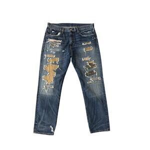 Distressed Blue Women’s Jeans with Patchwork Detail